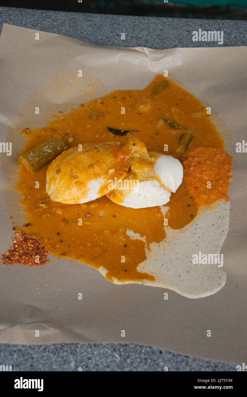 Curried egg breakfast, Indian meal, Little India, Singapore Stock Photo