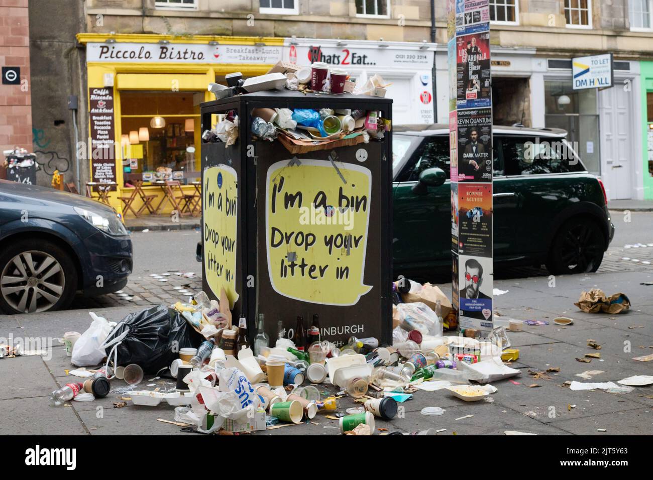 Edinburgh Scotland, UK. 28th Aug, 2022. Bins overflow with litter in the city centre due to strike action by workers. Credit: SST/Alamy Live News Stock Photo