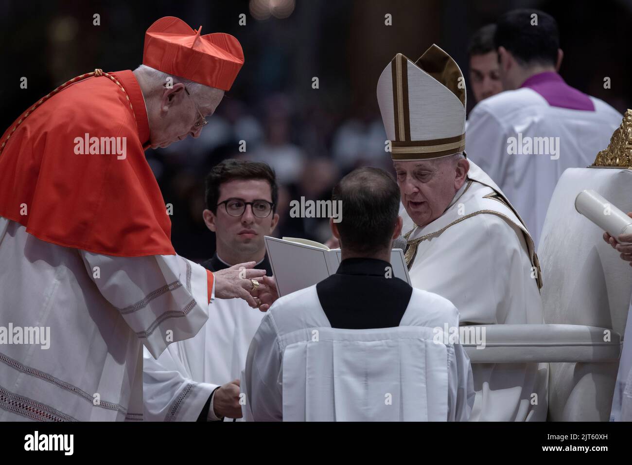 Vatican City, Vatican, 27 August 2022.   Newly appointed Cardinal Fernando Vergez Alzaga, L.C., emeritus archbishop of Villamagna,  receives the red hat, biretta, from Pope Francis during an extraordinary consistory for the creation of 21 Cardinals, in St. Peter's Basilica. Credit: Maria Grazia Picciarella/Alamy Live News Stock Photo