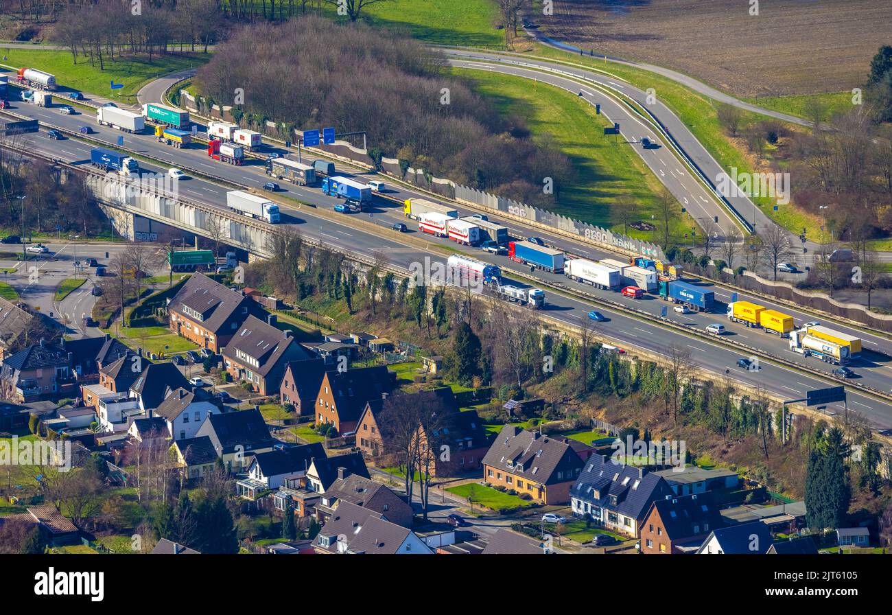 Aerial view, living at the freeway, traffic jam on A2 freeway, city forest, Bottrop, Ruhr area, North Rhine-Westphalia, Germany, Autobahn, DE, Europe, Stock Photo