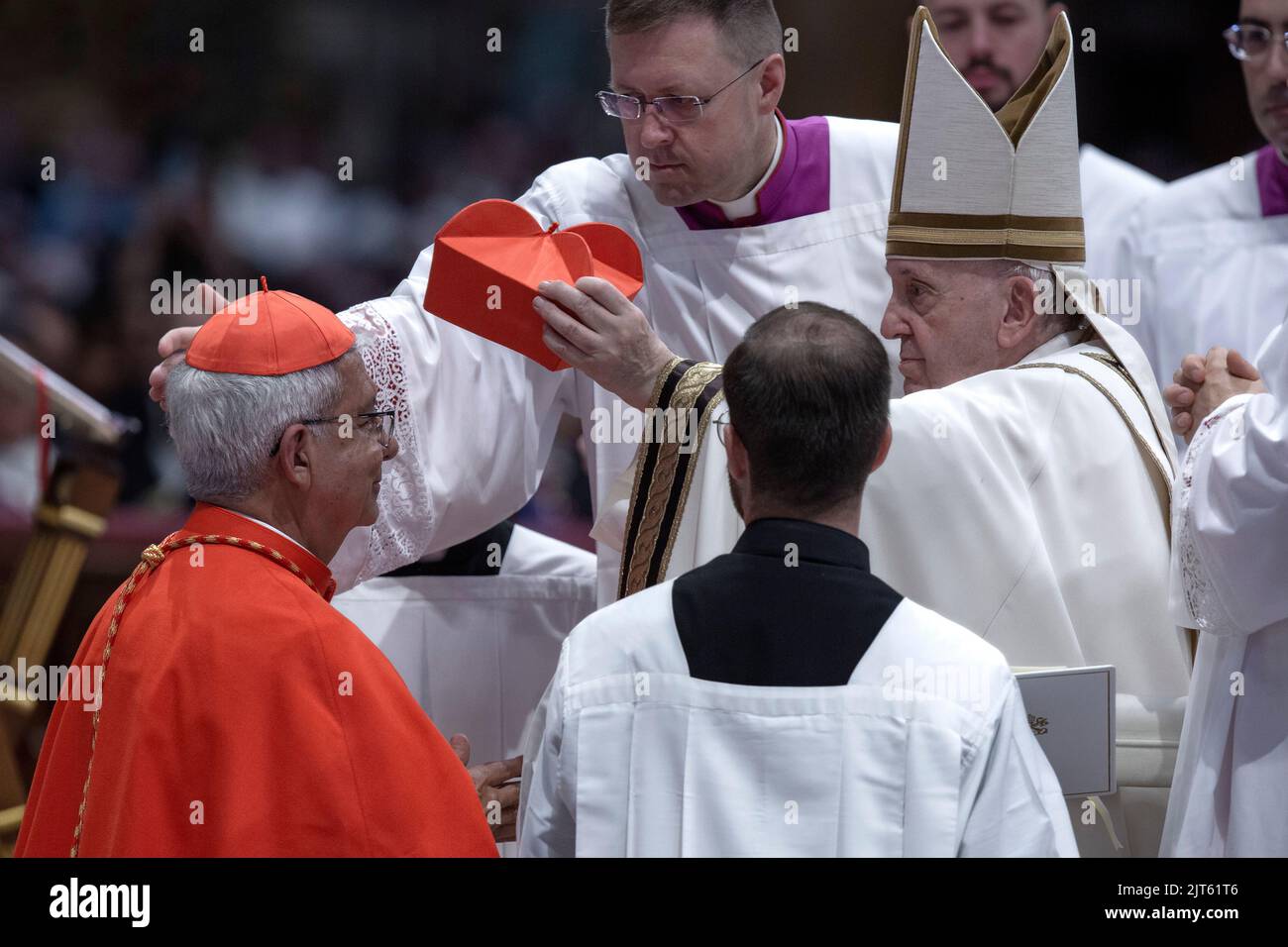 Vatican City, Vatican, 27 August 2022.   Newly appointed Cardinal Adalberto Martinez Flores, archbishop of Asuncion (Paraguay),  receives the red hat, biretta, from Pope Francis during an extraordinary consistory for the creation of 21 Cardinals, in St. Peter's Basilica. Credit: Maria Grazia Picciarella/Alamy Live News Stock Photo
