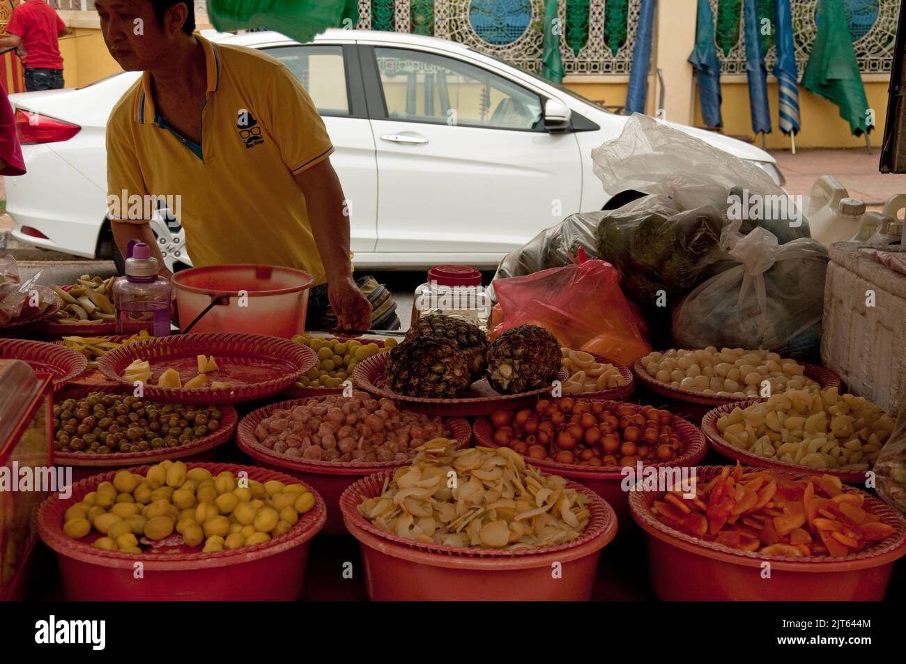 Fruit Seller outside Buddhist Temple, George Town, Penang, Malaysia, Asia Stock Photo