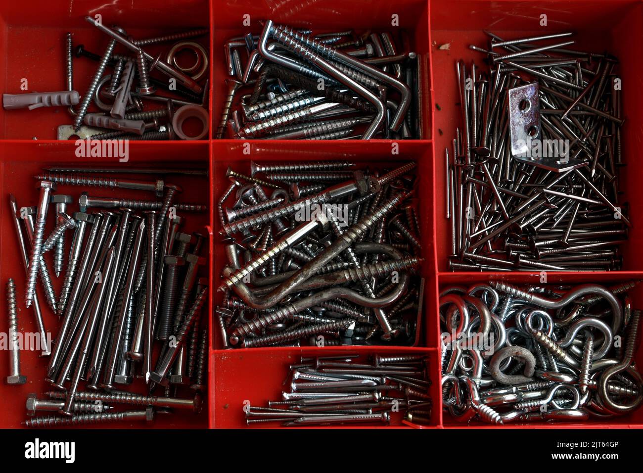 Screw Set Red Box A pile of screws in a red box Stock Photo - Alamy