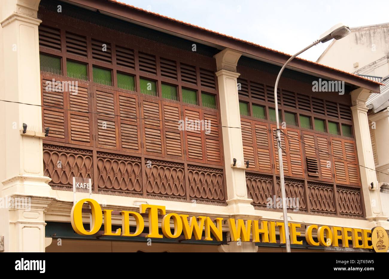 Old Colonial Building with Sign for Old Town White Coffee,