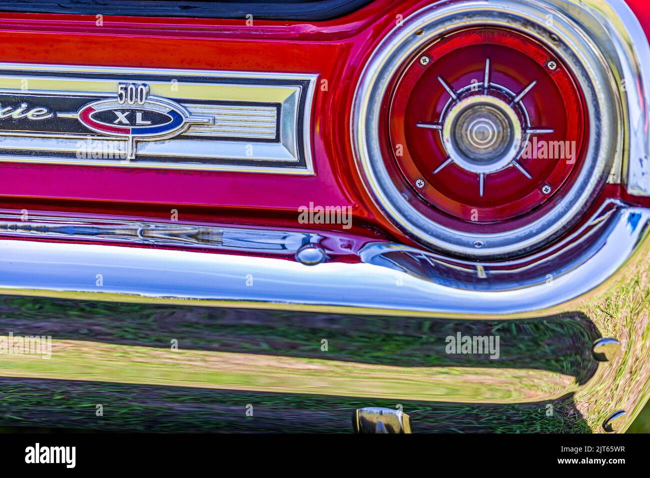 Statesboro, GA - May 17, 2014: Shallow depth of field closeup of the taillight assembly details on a 1964 Ford Galxie 500 XL convertible. Stock Photo