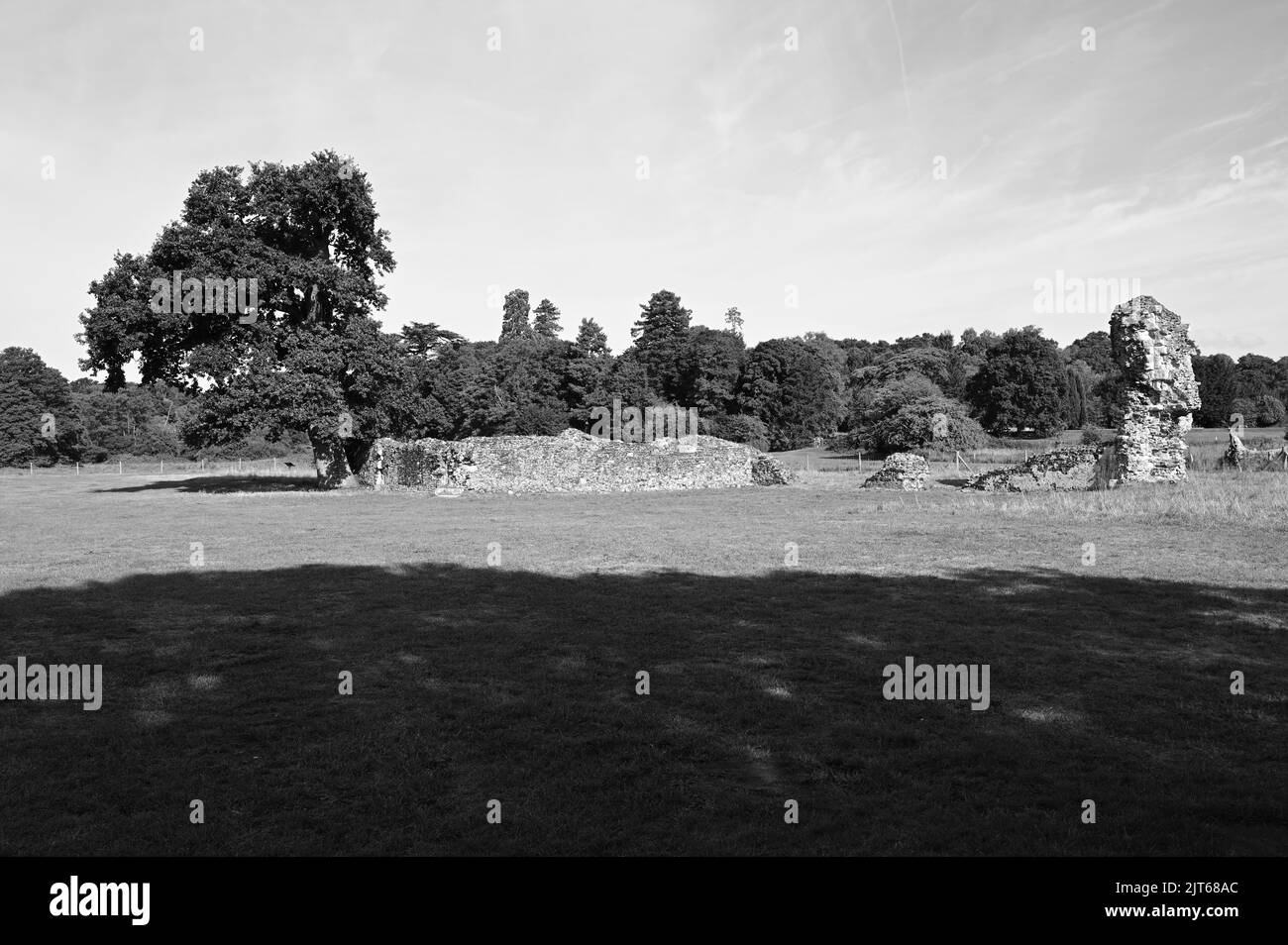 Stone Priory The stone walls of the ruins of a Norman abbey in the UK Stock Photo ...