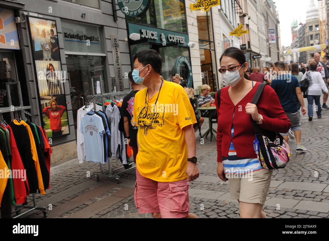 Copenhagen /Denmark/28 August 2022/Asian tourts wears face mask in