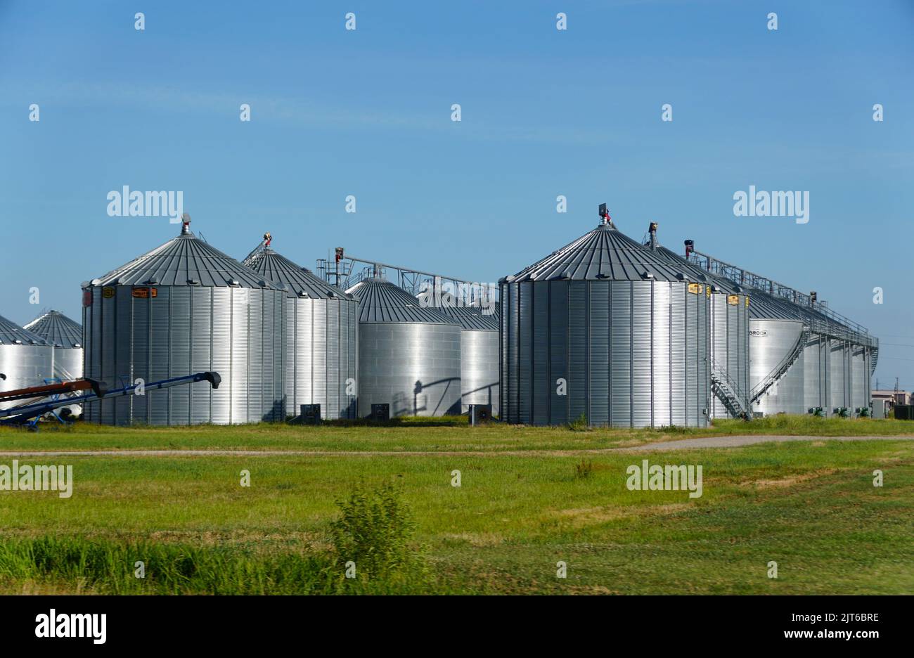 Arkansas, U.S.A - June 24, 2022 - Large grain silo near the wheat farm Stock Photo