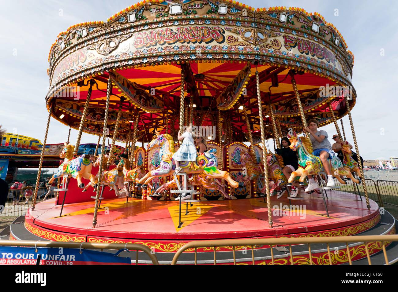 Silverstone Circuit, Silverstone, Nr, Towcester, 28th August,  2022. Carousel Funfair Ride on the Village Green at the 2022 Silverstone Classic.  Credit John Gaffen/Alamy Live News Stock Photo