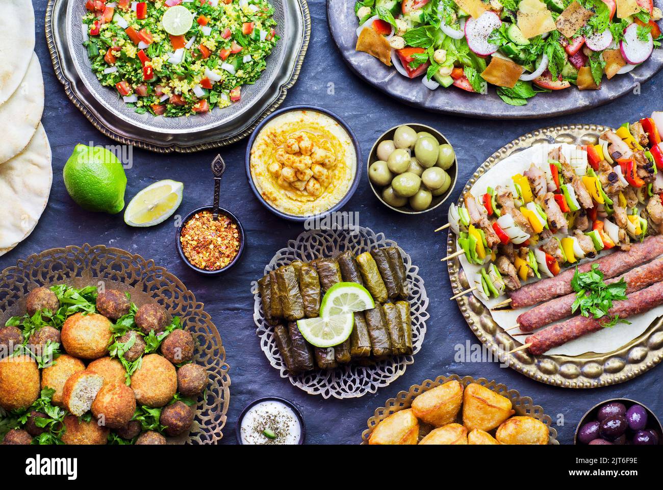 Arabic cuisine; Middle Eastern traditional dishes.  Top view with close up. Halal food concept. Stock Photo