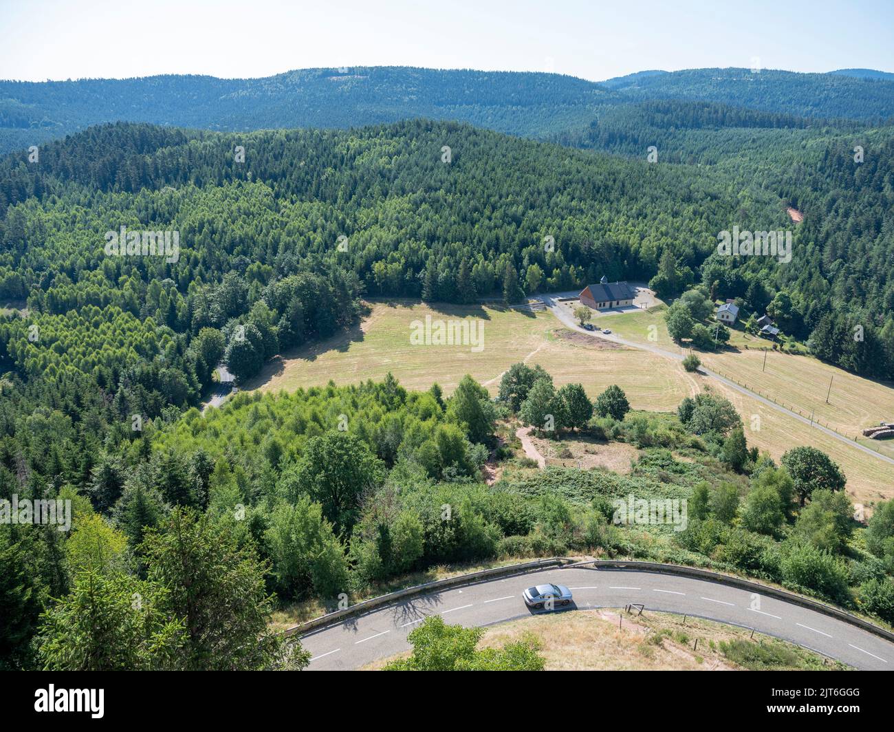 car in vosges landscape seen from rock of dabo in france Stock Photo