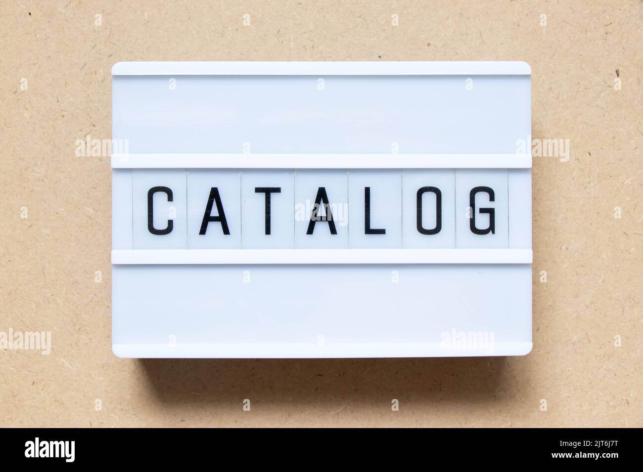 Lightbox with word catalog on wood background Stock Photo