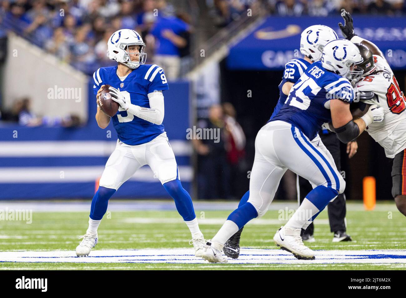 August 20, 2022, Indianapolis, Indiana, U.S: Indianapolis Colts quarterback  Nick Foles (9) huddles with his receivers during warmup for the preseason  game between the Detroit Lions and the Indianapolis Colts at Lucas