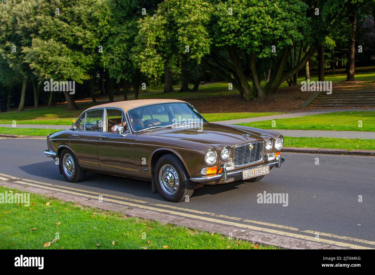 1972 70s seventies Brown JAGUAR XJ 4235cc; arriving at The annual