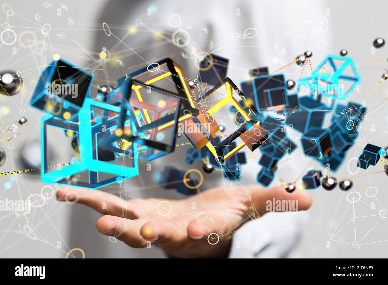 A 3D rendering of illustrative cube icons floating on a person's hand ...