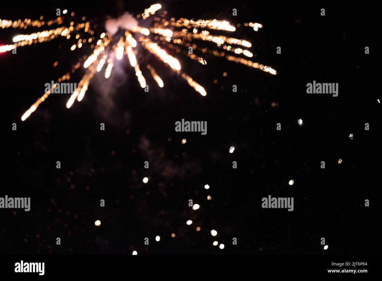 Distance Firework Background Blurred background. Fireworks in the night sky in the distance. Blurry ...