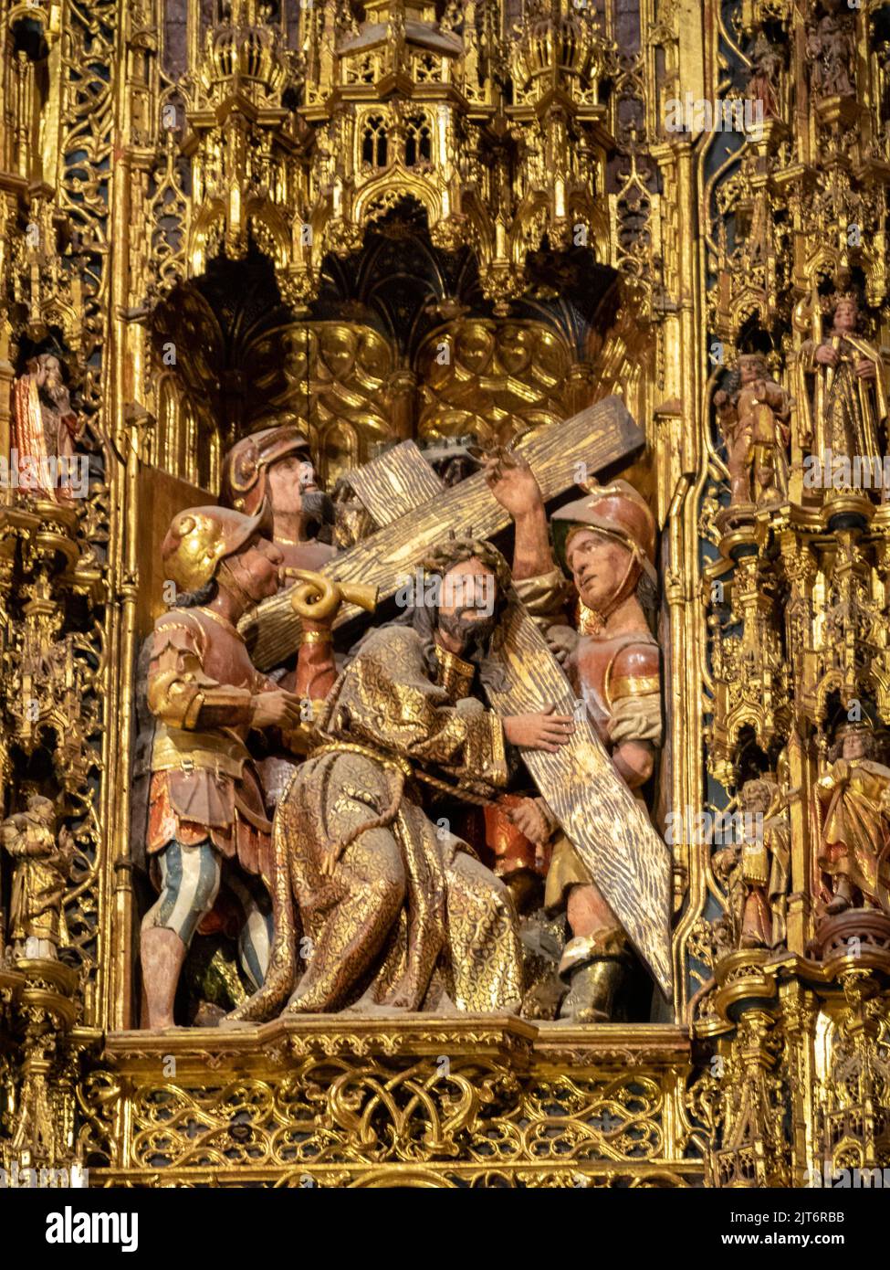 Christ carrying the cross depicted in the altarpiece of Seville Cathedral Main Chapel Stock Photo
