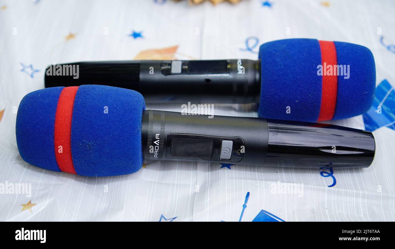 A closeup shot of two microphones for a high school graduation party and celebration Stock Photo