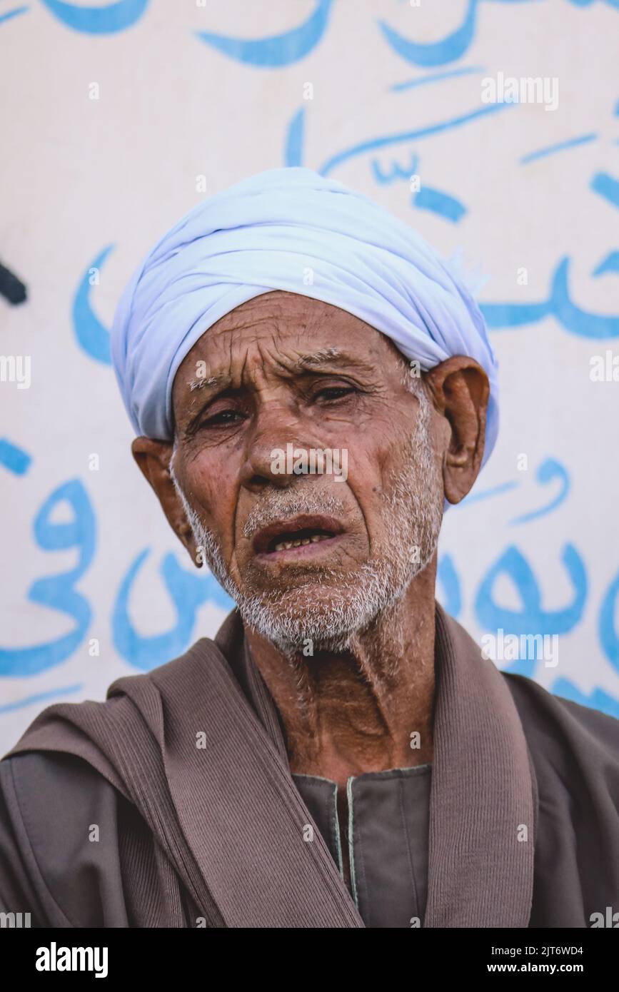 Luxor, Egypt - November 07, 2021: Close up Portrait of the Local Egyptian Old Man in Traditional Clothes Stock Photo