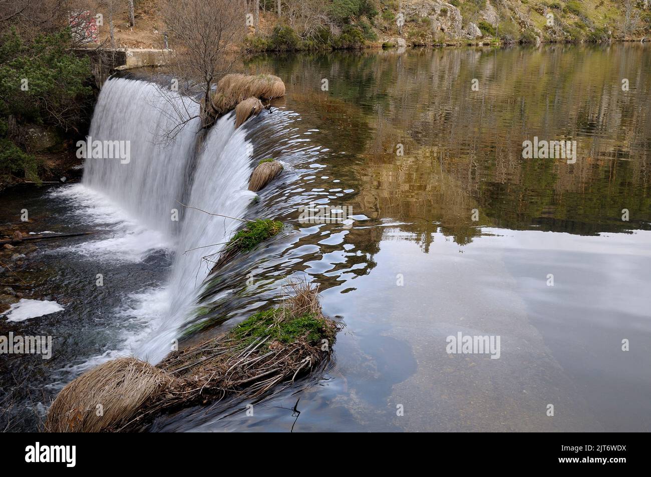 The Pradillo Reservoir in the dam of the Lozoya River in Rascafría, Madrid. Sierra de Guadarrama National Park. Stock Photo