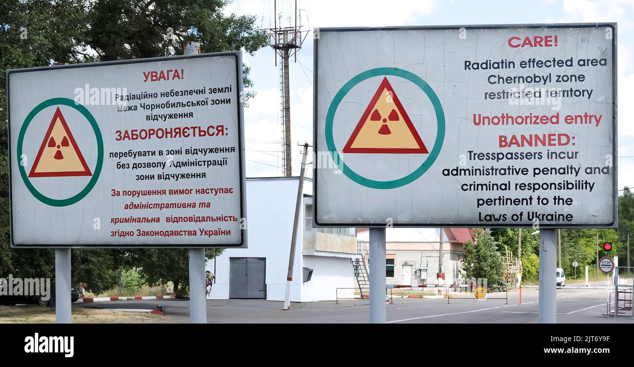 Warning sign at the entrance of the Chernobyl exclusion zone, Ukraine Stock Photo