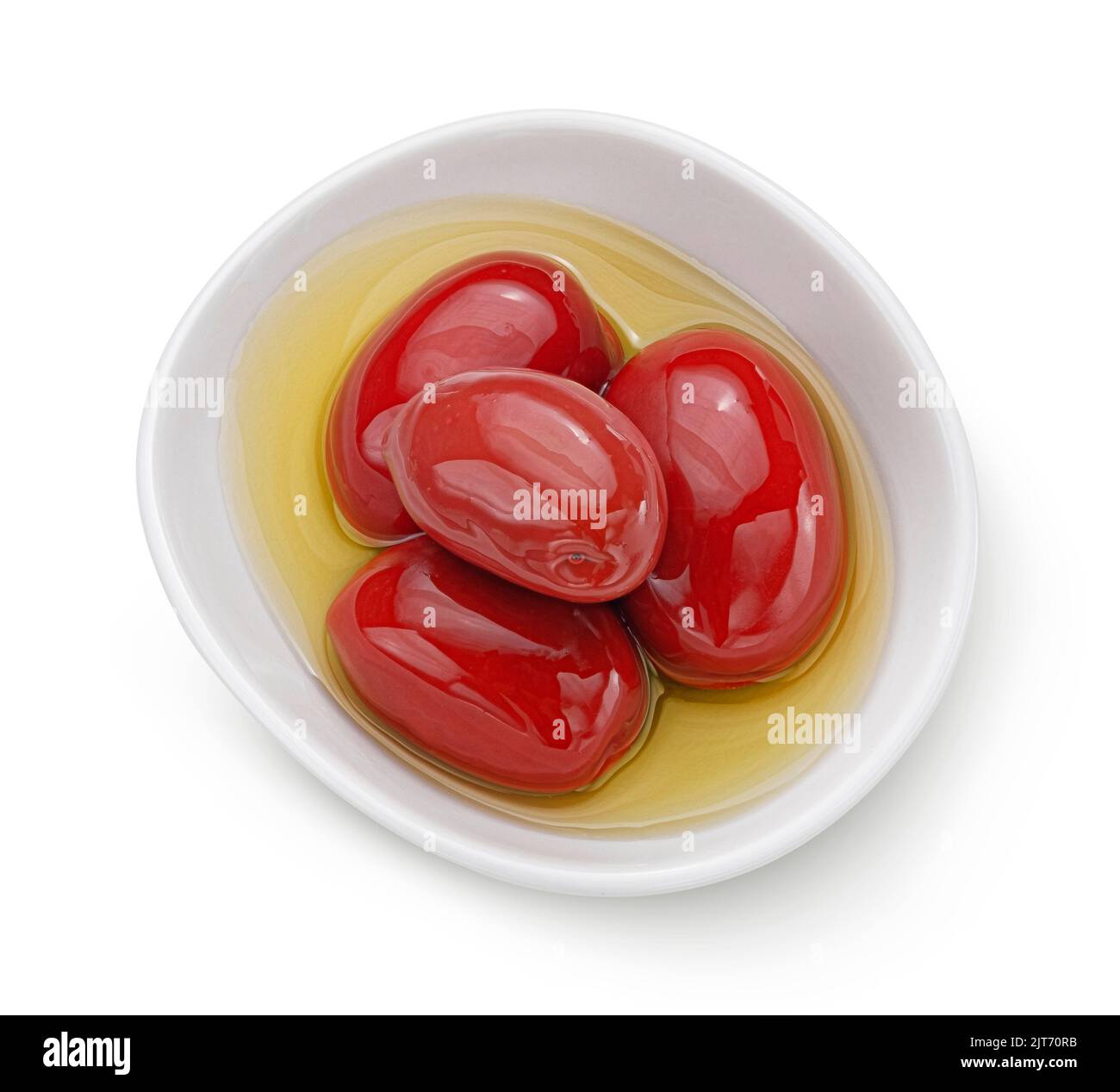 Red olives with oil isolated on white background, top view Stock Photo