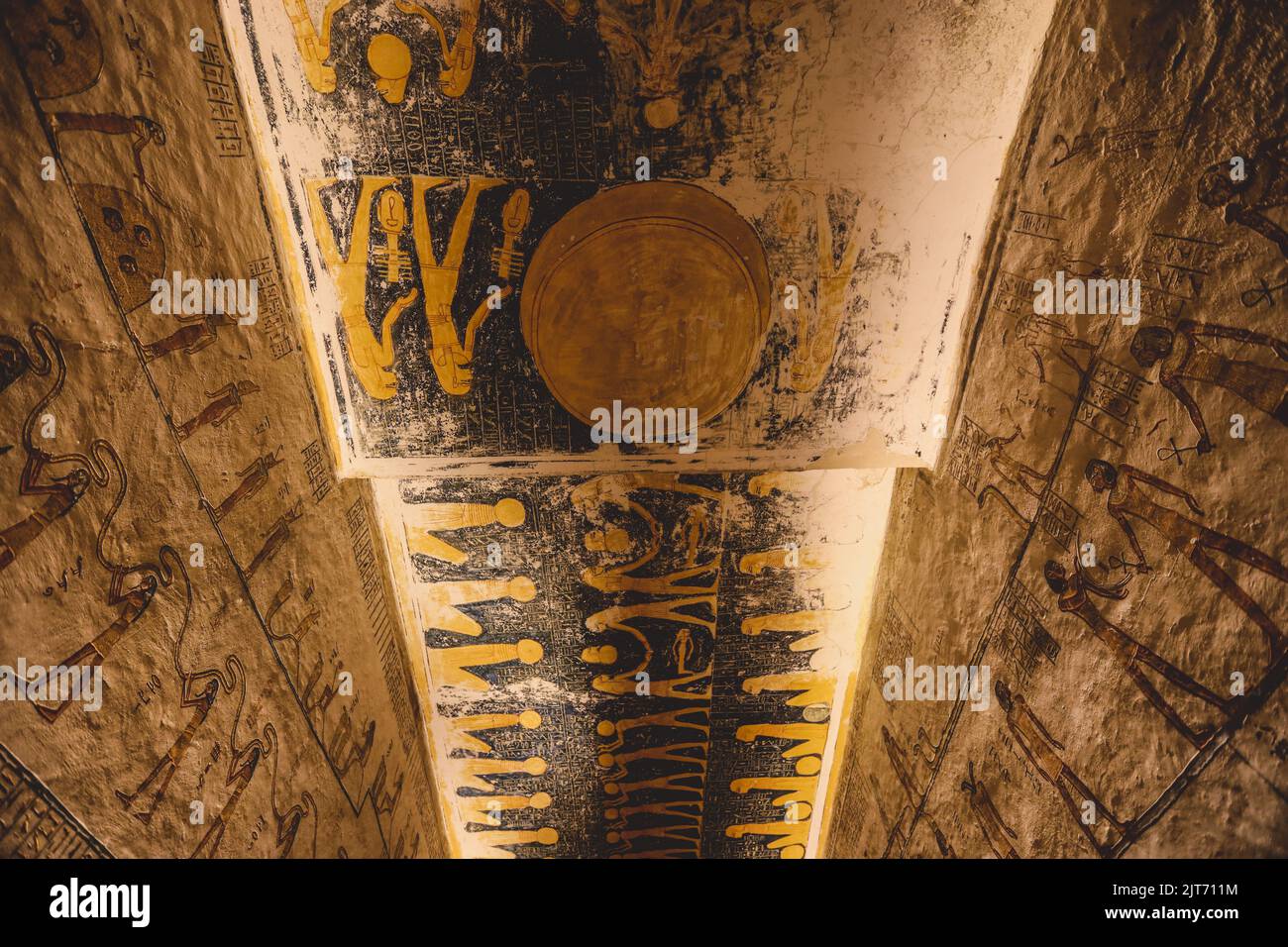 Ancient Egyptian Paintings on the Colorful Ceiling of the Valley of the Kings in Luxor, Egypt Stock Photo