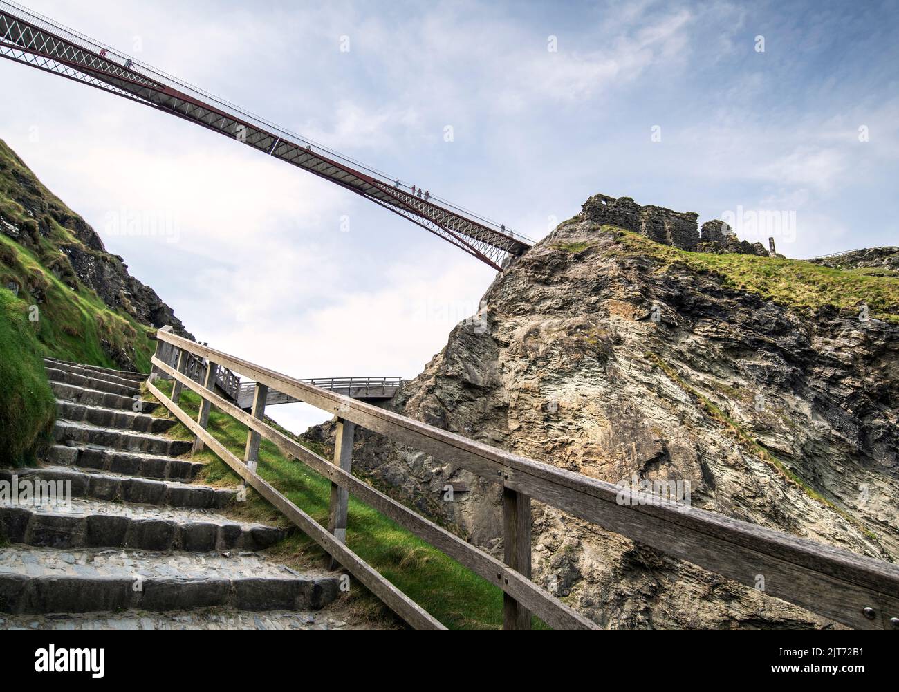 Suspension bridge giving access to Tintagel Castle in Cornwall, England, UK Stock Photo