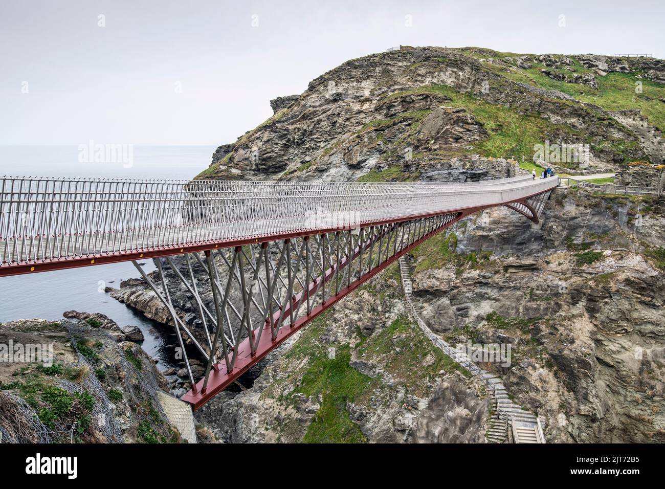 Suspension bridge giving access to Tintagel Castle in Cornwall, England, UK Stock Photo