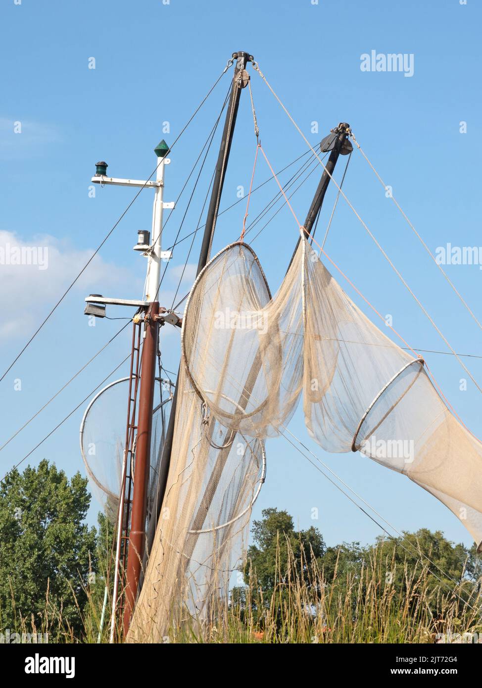 Vintage fishing nets, drying in the sun, ready to be used once again