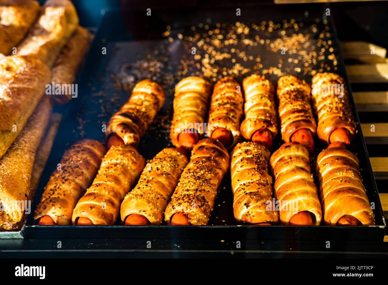 Baked pastry in a bakery window display Stock Photo - Alamy
