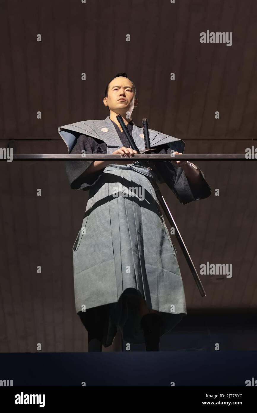 Samurai with two swords standing in the Samurai Museum, Berlin. Stock Photo