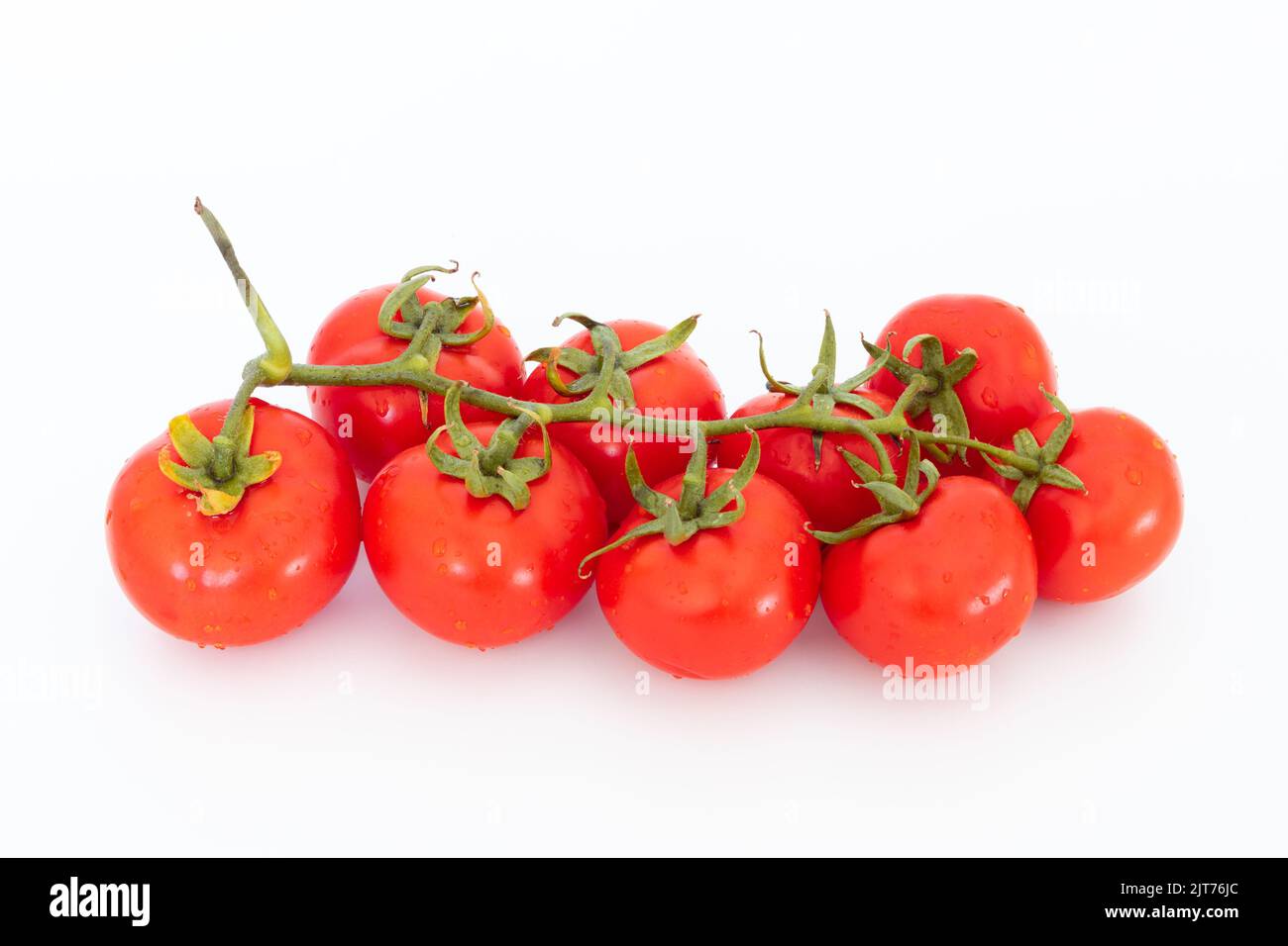 Fresh vegetable, red cherry tomato isolated on white background, food concept, copy space. Stock Photo