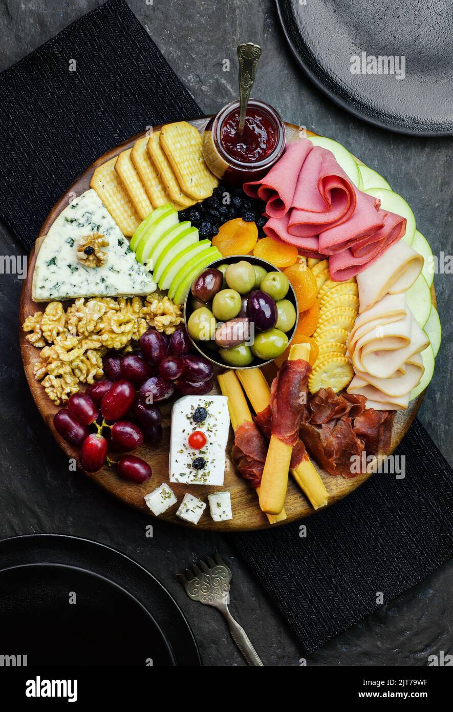 The perfect cheese platter with varieties of delicious fresh fruits