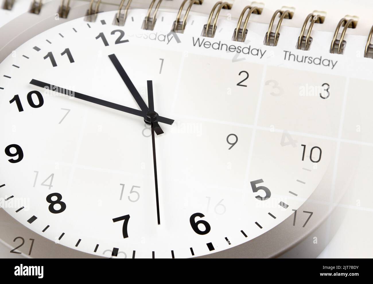 Clock face and calendar diary composite Stock Photo