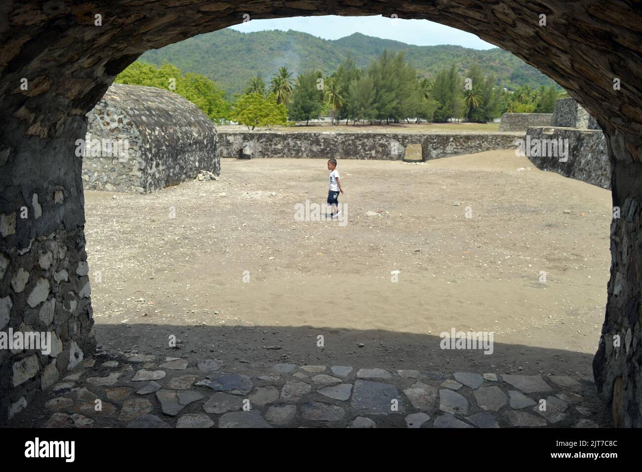 The kid on walking around Indra Patra fortress in Aceh Indonesia Stock Photo