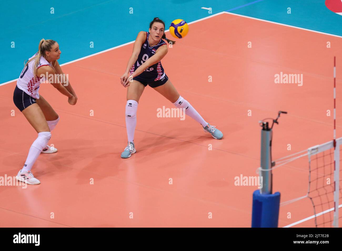 Dijana Karatovic and Lucija Mlinar of Croatia in action during European Volleyball Womens Championship Qualification Group A match between Croatia and Romania at Gradski Vrt indoor Arena on August 28, 2022 in