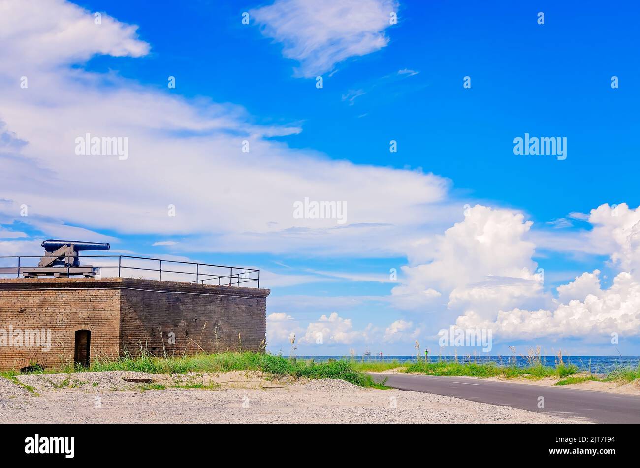 A Civil War cannon points at Mobile Bay from Fort Gaines, Aug. 27, 2022, in Dauphin Island, Alabama. Stock Photo