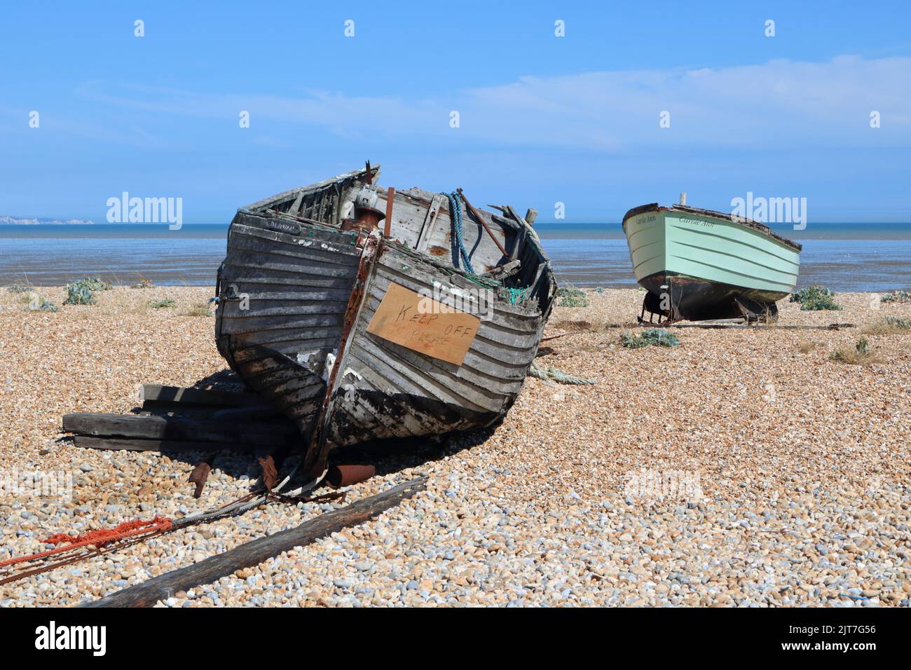Carole Ann green fishing boat on the shingle beach at Dungeness Kent UK Stock Photo