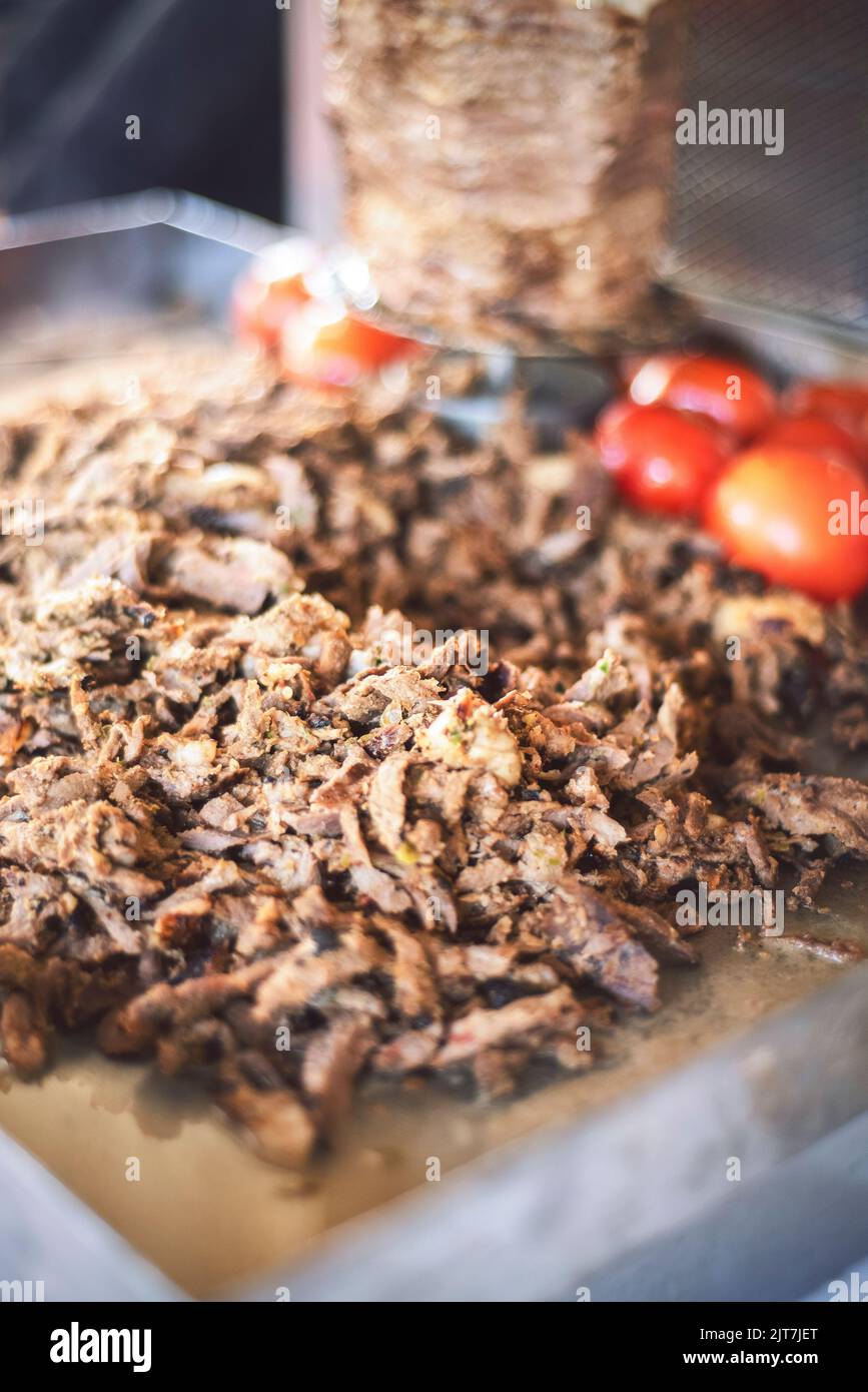 Arabic Cuisine; Delicious thin cuts of seasoned meat. Close up for