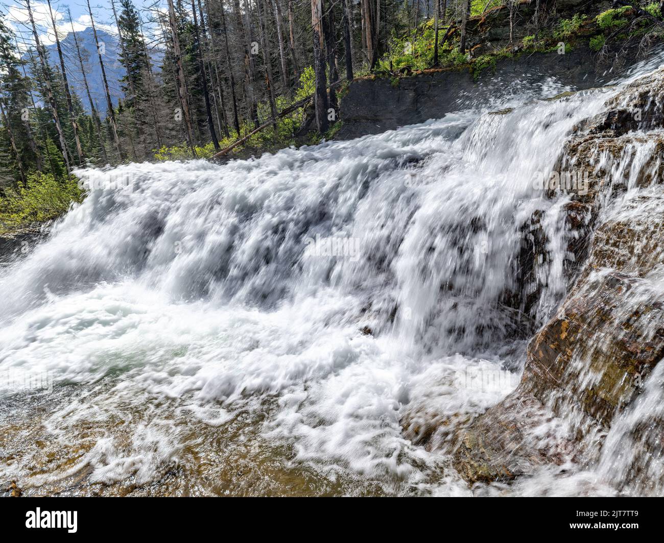 Wide waterfall in the mountains of Montana Stock Photo
