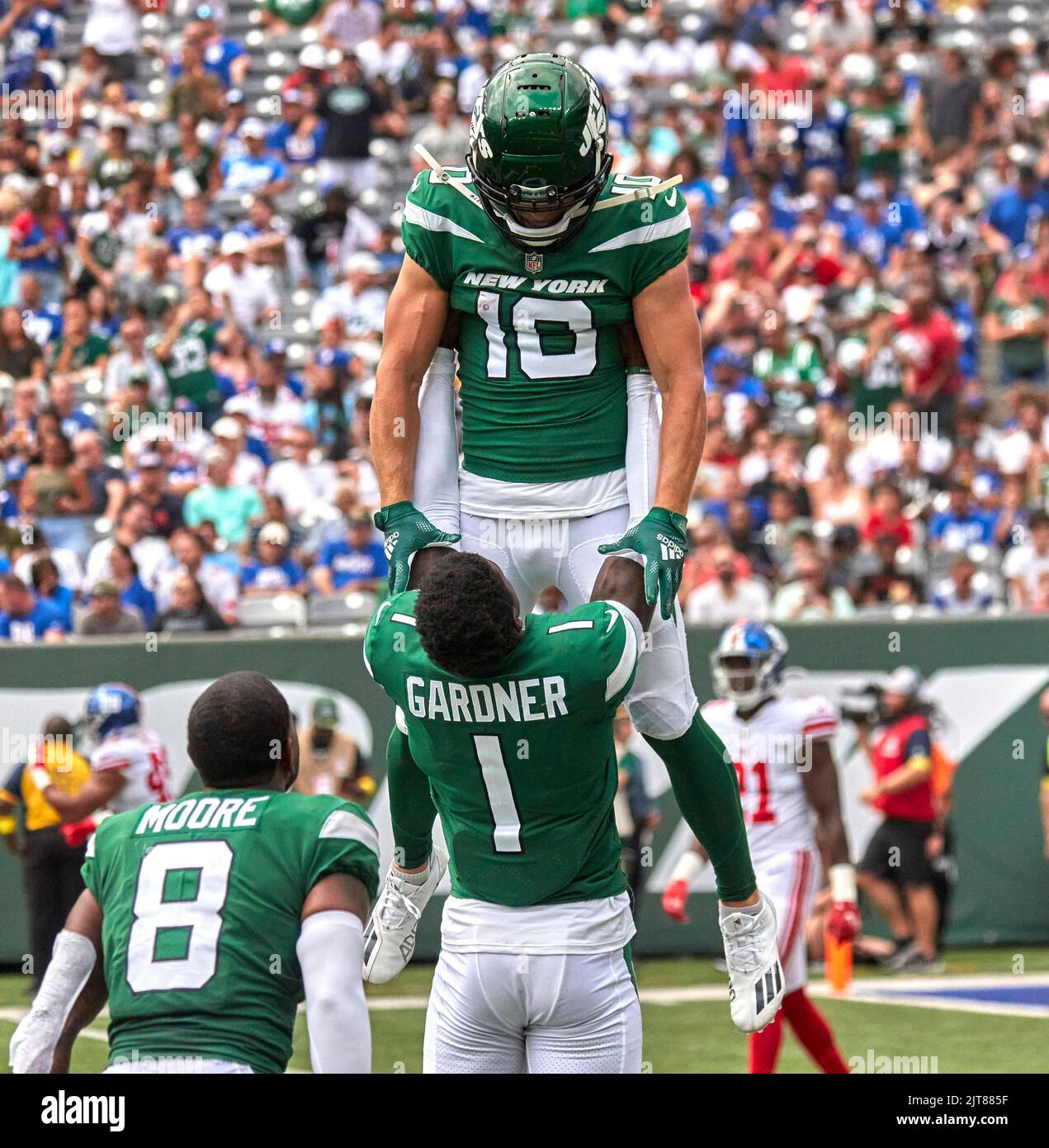 East Rutherford, New Jersey, USA. 28th Aug, 2022. New York Jets wide  receiver BRAXTON BERRIOS (10) runs for a touchdown at MetLife Stadium in  East Rutherford New Jersey New York Jets defeat