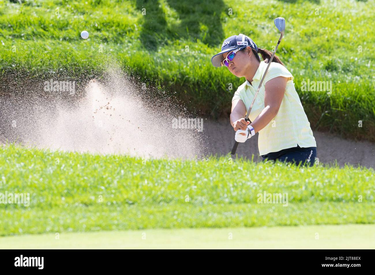 Ottawa, Canada. 28th Aug, 2022. August 28, 2022: Danielle Kang of the United States takes a sand wedge shot form a 12th hole bunker during the final round of the CP Womens Open held at Ottawa Hunt & Golf Club in Ottawa, Canada. Daniel Lea/CSM Credit: Cal Sport Media/Alamy Live News Stock Photo