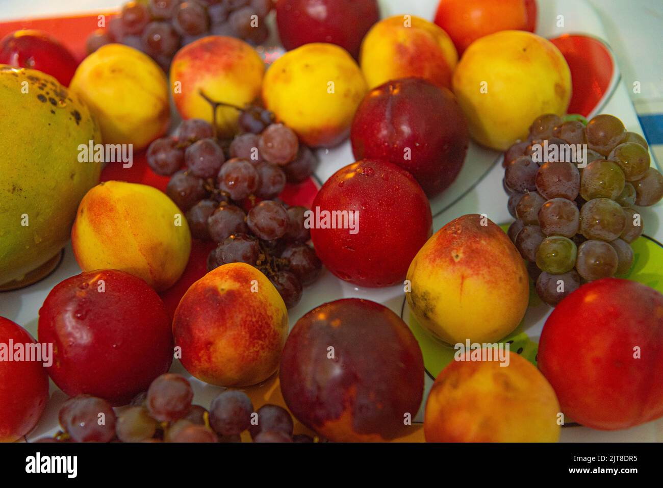 Tray with fresh tropical fruits. Natural fruits ready to eat. Fruits