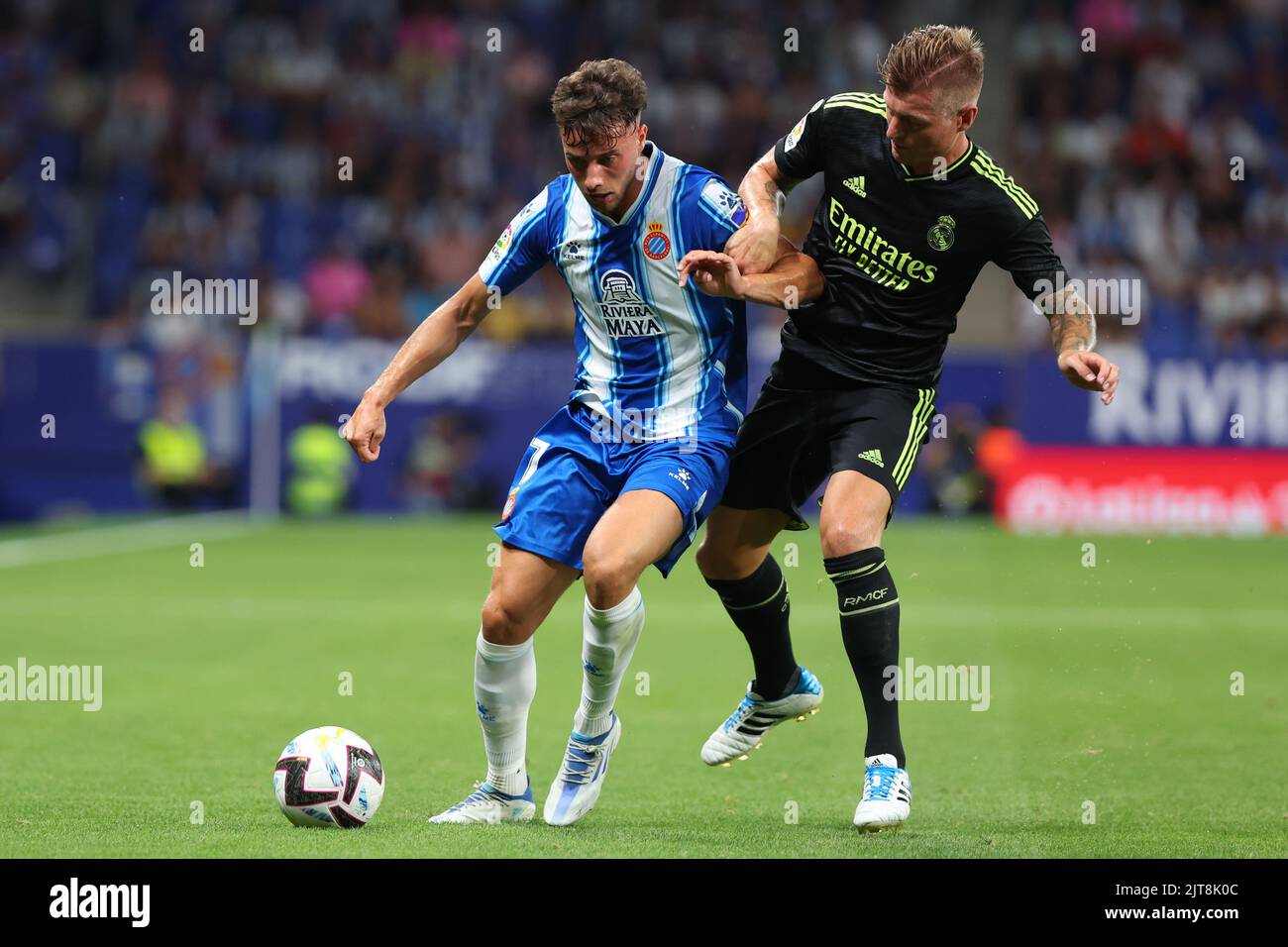 Barcelona, Spain. 28th Aug, 2022. Javi Puado of RCD Espanyol in action with Toni Kroos of Real Madrid during the La Liga match between RCD Espanyol and Real Madrid at RCDE Stadium in Barcelona, Spain. Credit: DAX Images/Alamy Live News Stock Photo