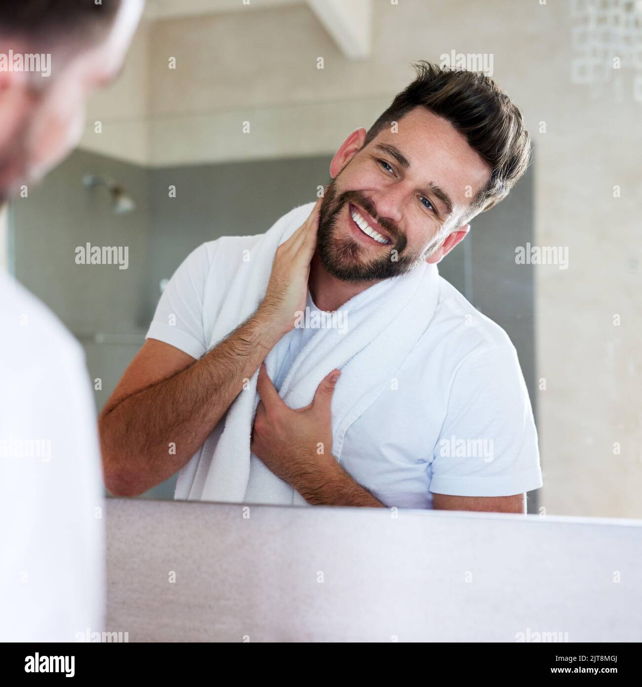 Cleanliness is next to godliness. a handsome young man going through is ...
