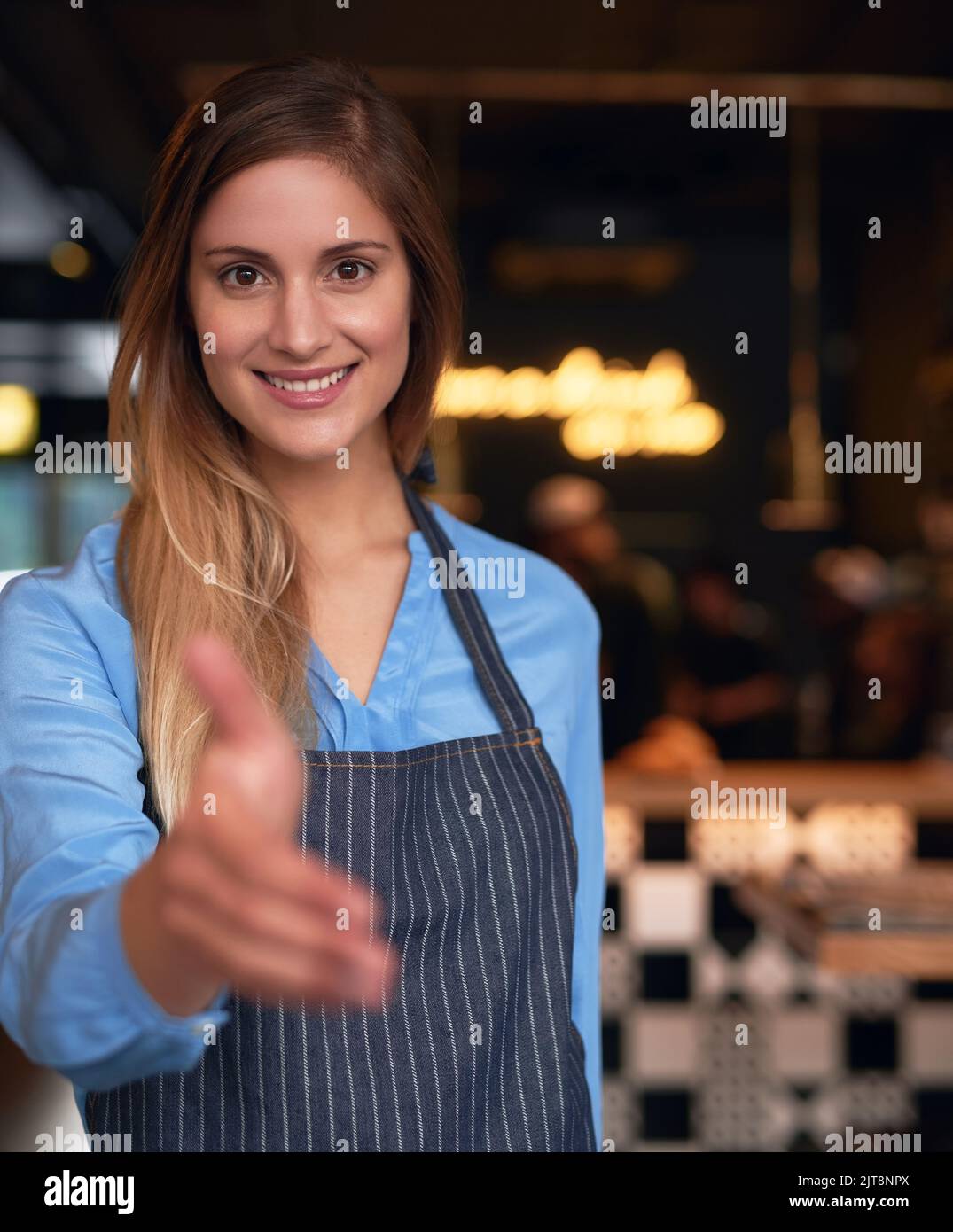 to my coffee shop. Cropped portrait of an attractive young
