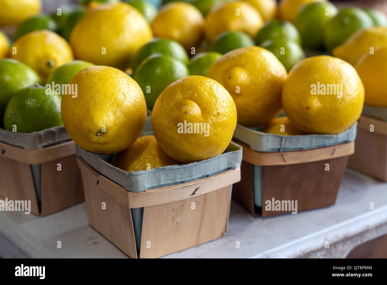 lemons and limes on sales at summer market Stock Photo