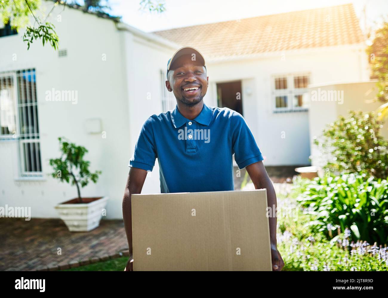 Your package is in safe hands. Portrait of a young delivery man