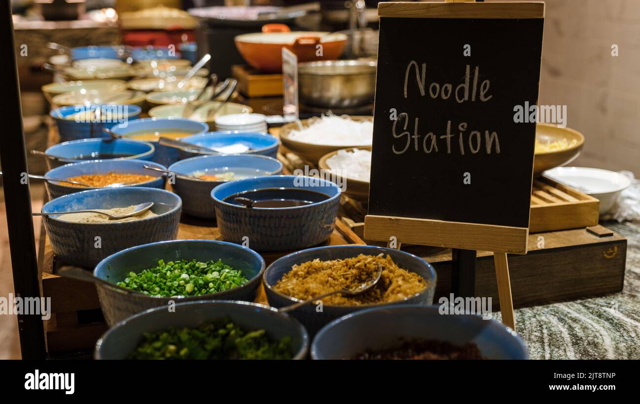 Breakfast buffet in a luxury hotel. Noodle bar at the buffet, Asian
